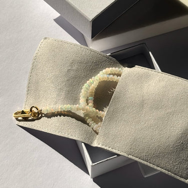 ETHIOPIAN OPAL CANDY BEAD NECKLACE (4.5MM-10MM BEADS) (WHITE)